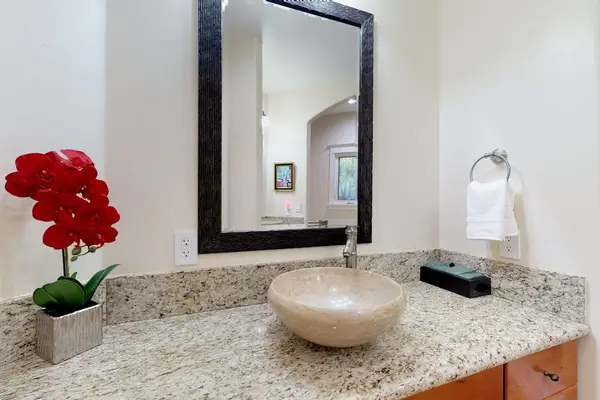 Master bathroom complete walk-in shower and Jacuzzi tub.