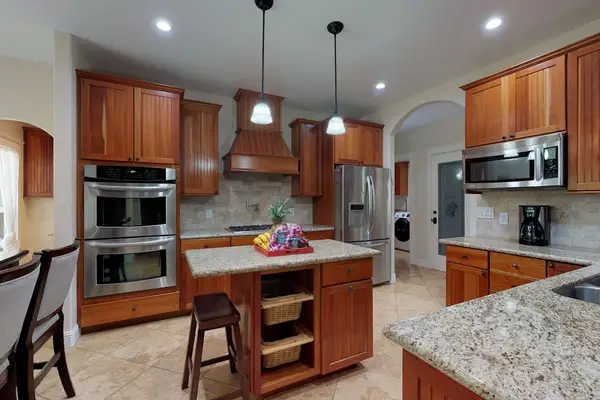 Large open remodeled stainless steel kitchen.  Fully stocked and ready for the chef in you.