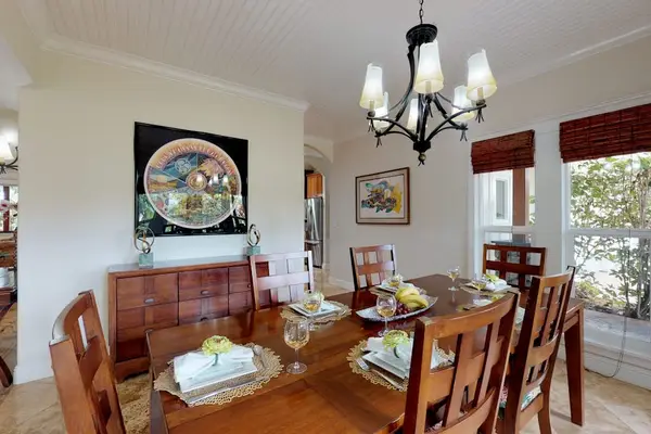 Dining room table with seating for eight - another table for extra seating.