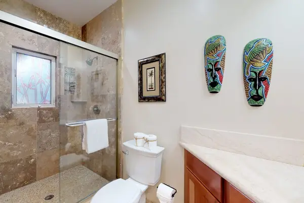 Guest bathroom with tub/shower combo.