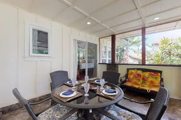 Plenty of seating on the lanai to relax and read a book or sit and dine.