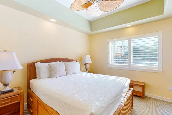 Queen Bedroom Suite with Wooden Bed Frame, Nightstands, and Bright Windows