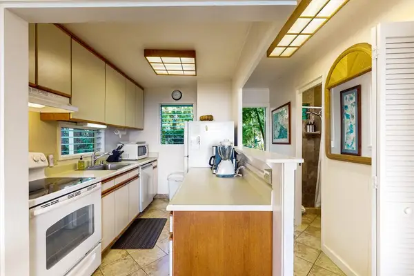 Well-designed kitchen with generous counter space for easy meal preparation.
