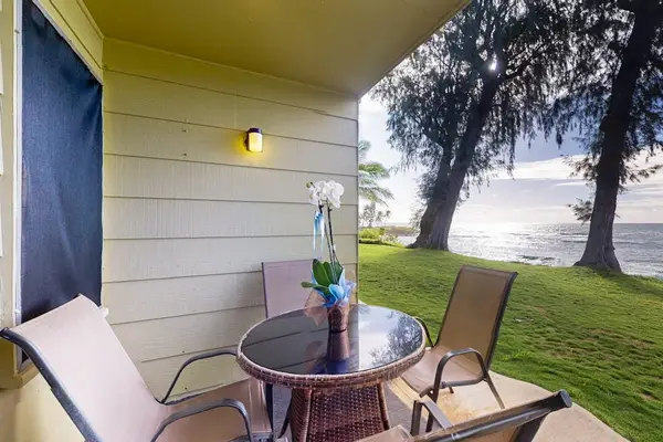 Enjoy ocean breezes from your private lanai with comfortable seating.