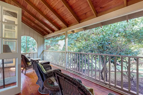 Unwind on the balcony with inviting seating and refreshing tropical breezes every day