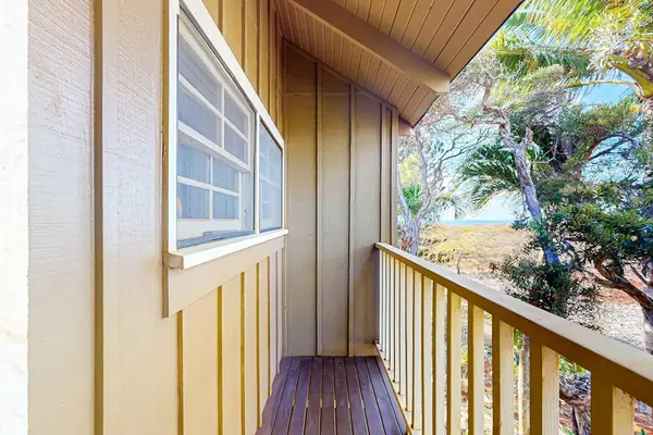Balcony walkway offers tropical views and easy outdoor access