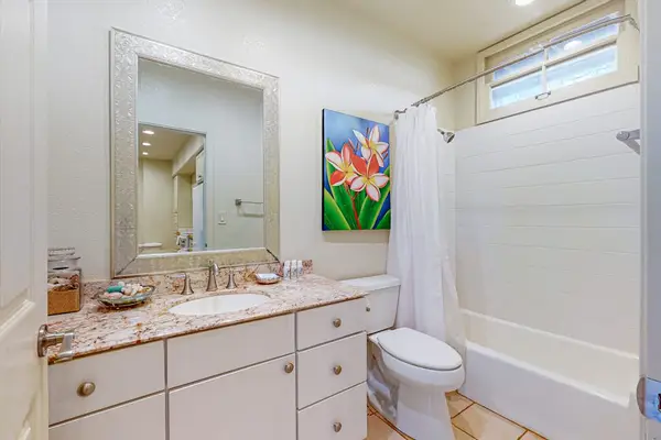 Clean bright bathroom provides practical comfort for a relaxing and enjoyable vacation experience