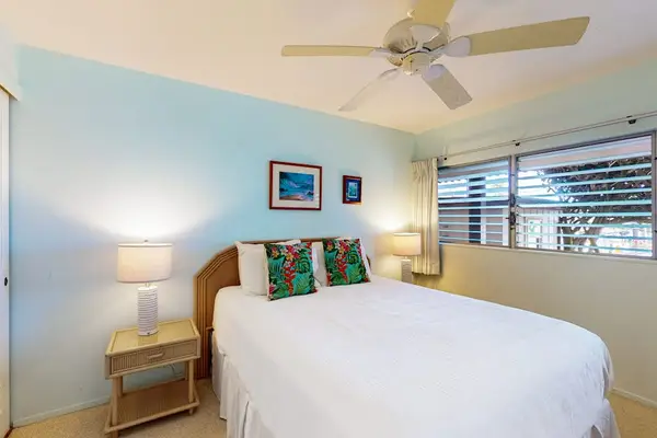 Primary suite with comfortable bed for quality sleep