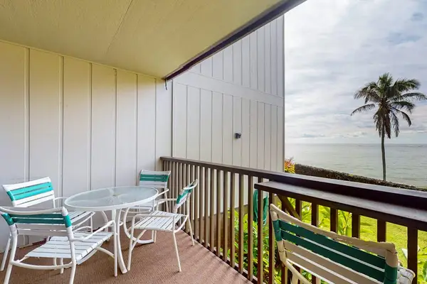 Lanai with comfortable seating for unwinding outside