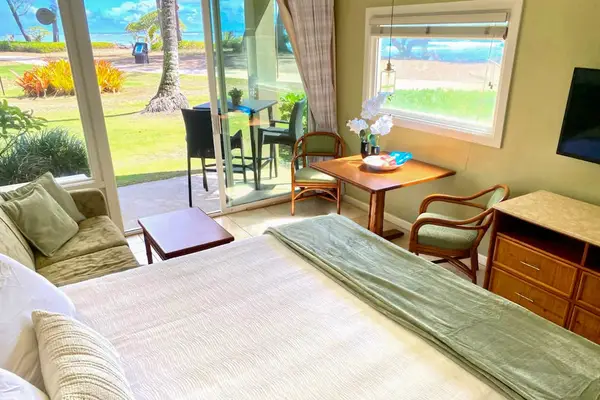Cozy living area with tropical views