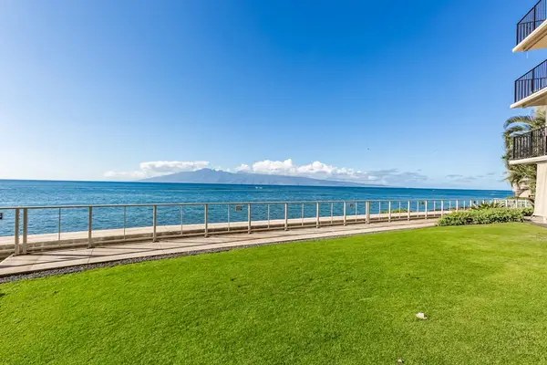 Expansive Oceanfront Lawn Retreat