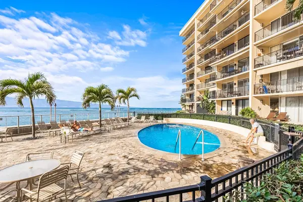 Relax Poolside In Tropical Bliss