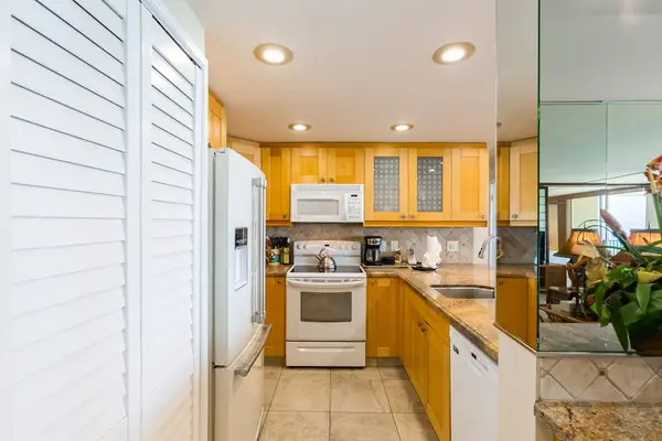 Bright Galley Kitchen With Ocean Access
