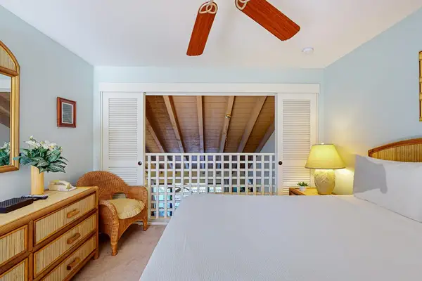Relax in a welcoming bedroom with island-inspired style