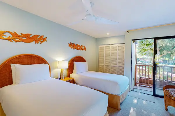 Rest easy in a comfortable bedroom with two beds