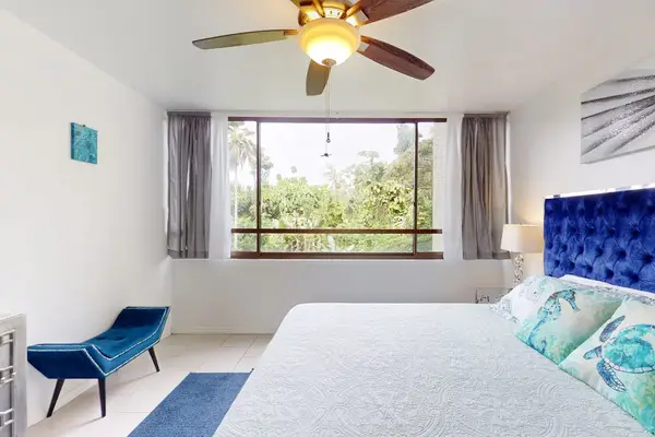Peaceful Primary Bedroom Filled With Sunshine