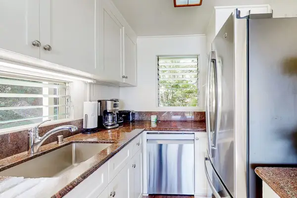 Contemporary kitchen featuring ample storage and modern finishes.