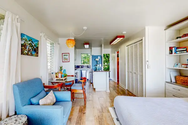 Spacious interior blending sleeping, dining, and living areas seamlessly.