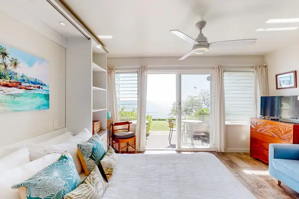 Bright studio with a private lanai and beautiful ocean views.
