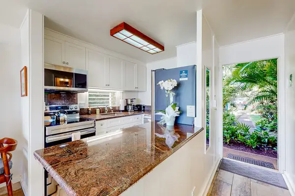 Functional kitchen with generous workspace for everyday cooking.