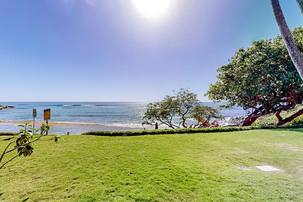Enjoy tranquil beachfront scenery from the expansive oceanfront lawn.