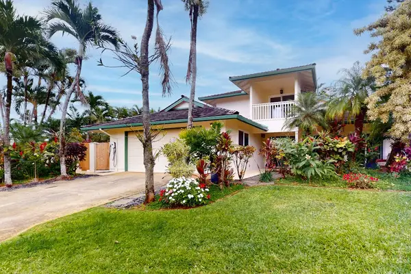 Kohola Hale welcomes guests among palms gardens and island charm