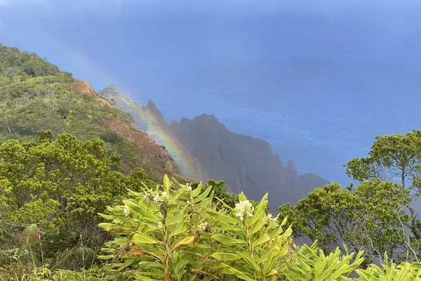 Magical Island Rainbows Dancing Over Dramatic Mountain Ridges