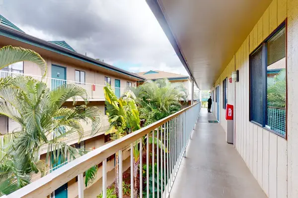 Open-Air Breezeway With Island Charm
