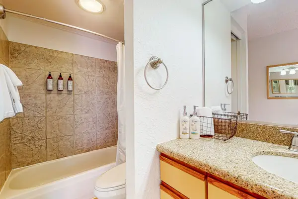 Full Bathroom With Tub And Shower
