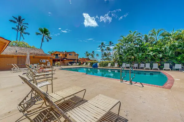 Soak up the Hawaiian sunshine beside the sparkling resort-style pool.
