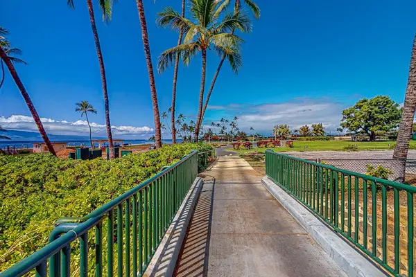 Follow the scenic garden walkway toward the beautiful oceanfront.