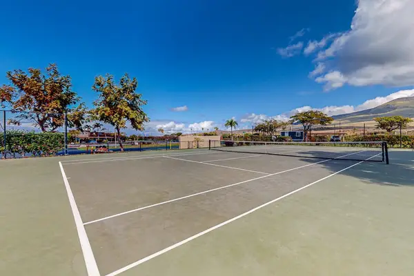 Enjoy a friendly match on the resort's outdoor tennis court.