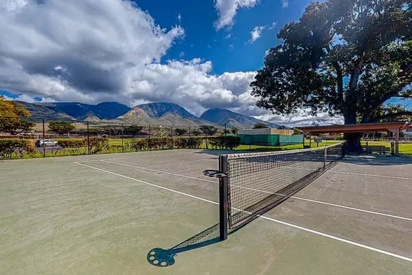 Enjoy a game of tennis while taking in beautiful mountain views.