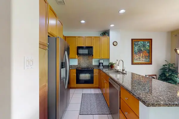 Fully stocked kitchen allowing the chef to prepare any meal.  Large countertop for extra prep space or for extra seating with the barstools for dining.