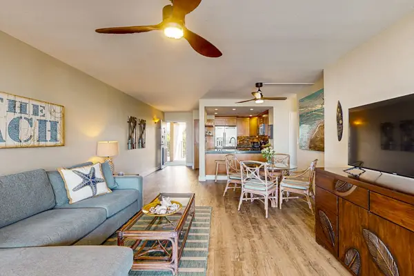 Living room with comfortable seating and flat screen tv great for a family movie night.