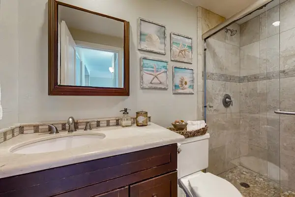 Guest bathroom with newly remodeled walk-in shower.