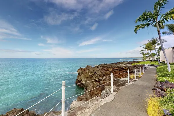 Scenic Oceanfront Walking Path Along Rocky Coastline with Panoramic Views