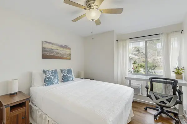 Enjoy restful nights and productive mornings with a queen bed and dedicated workspace.