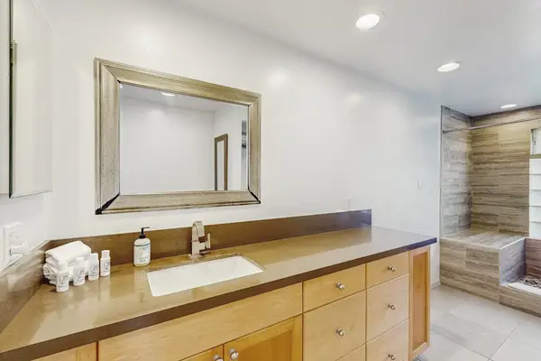 Freshen up with ease in this inviting full bathroom.