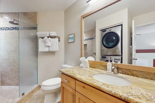Fresh bathroom showcases updated fixtures, a vanity, and bright finishes