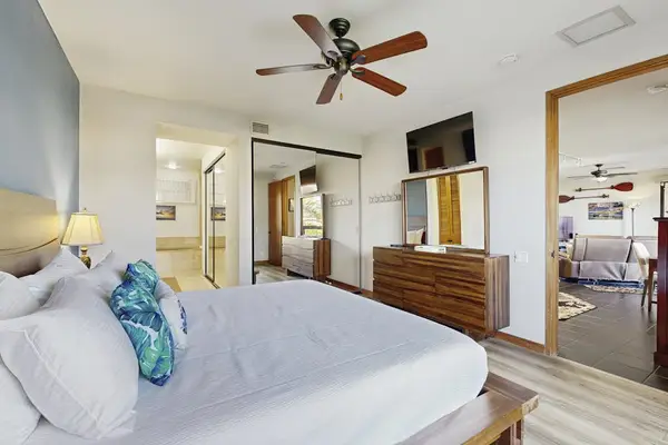 Soft natural light creates a relaxing bedroom atmosphere.