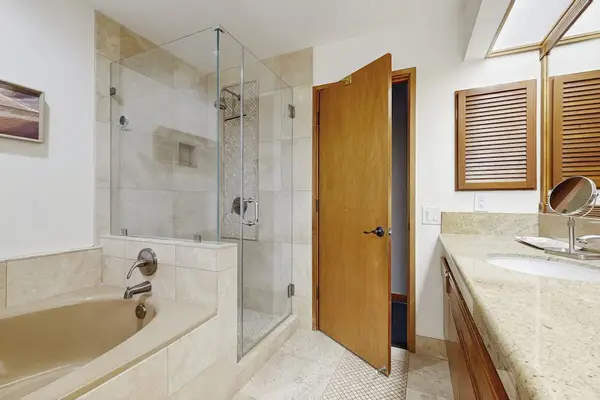 A convenient full bathroom with both a tub and shower.
