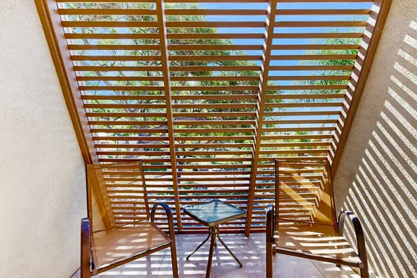 Enjoy peaceful moments on the shaded lanai