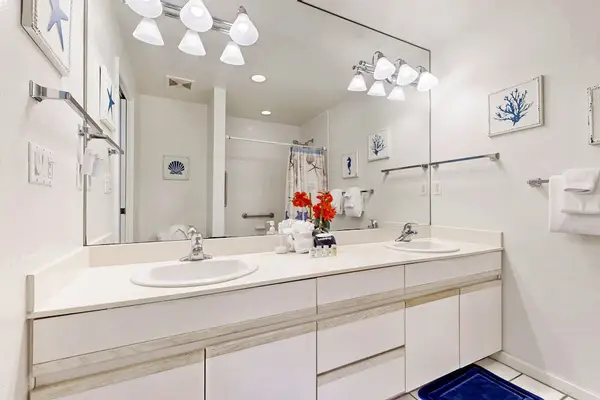 Full Bathroom shower combines clean tilework with refreshing everyday convenience