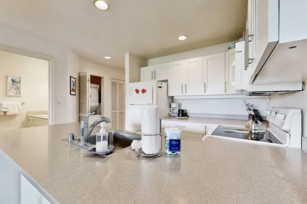Bright appliances and generous surfaces simplify every breakfast preparation routine