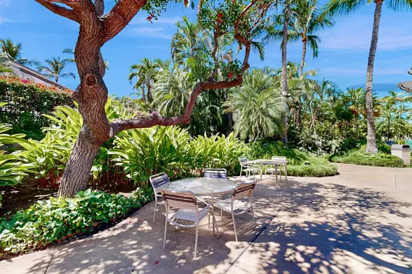 Garden barbecue area makes casual grilling convenient beneath island skies