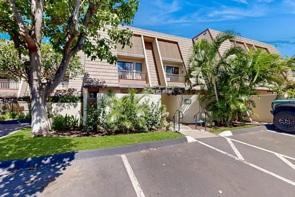 Exterior grounds showcase resort architecture surrounded by palms and gardens