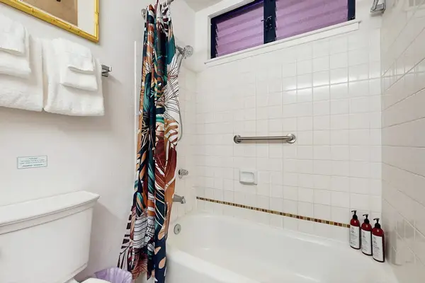Bright Bathroom With Tub And Shower