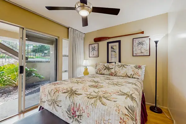 Cozy guest bedroom with garden access.