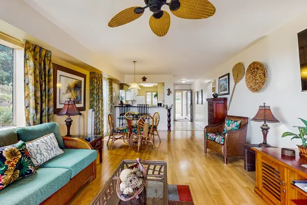 Spacious living area with tropical-inspired décor.